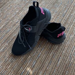 Black and pink Fila sneakers. Perfect for runners and gym work outs.